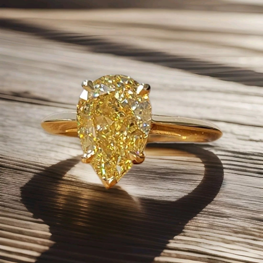 14k Yellow Gold Engagement Ring 3.51CT. Natural Pear cut Yellow Diamond GIA Cert: 14K YELLOW GOLD ENGAGEMENT RING 3.51CT. NATURAL PEAR CUT YELLOW DIAMOND GIA CERT This exquisite 14k yellow gold engagement ring is a true masterpiece. The ring features a stunning 3.51CT natural pear 