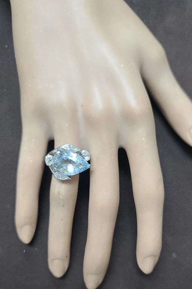 Platinum Vintage Ring 9.43ct.Natural Sky Blue Sapphire Pear Shape GIA cert: PLATINUM VINTAGE STATEMENT RING 9.43CT.NATURAL TEAL SAPPHIRE PEAR SHAPE GIA CERT Gorgeous Vintage Teal pear shape sapphire and old euro cut diamond platinum ring. Center set natural teal sapphire pear