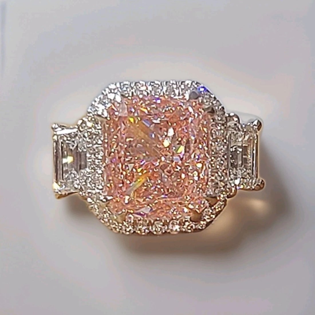 Platinum Engagement Ring 10.00ct Lab Grown Vivid Pink Diamond Cushion Shape IGI: PLATINUM ENGAGEMENT RING 10.00CT LAB GROWN VIVID PINK DIAMOND CUSHION SHAPE IGI This exceptional platinum engagement ring showcases a breathtaking 10.00-carat lab-grown cushion-cut pink diamond, IGI c
