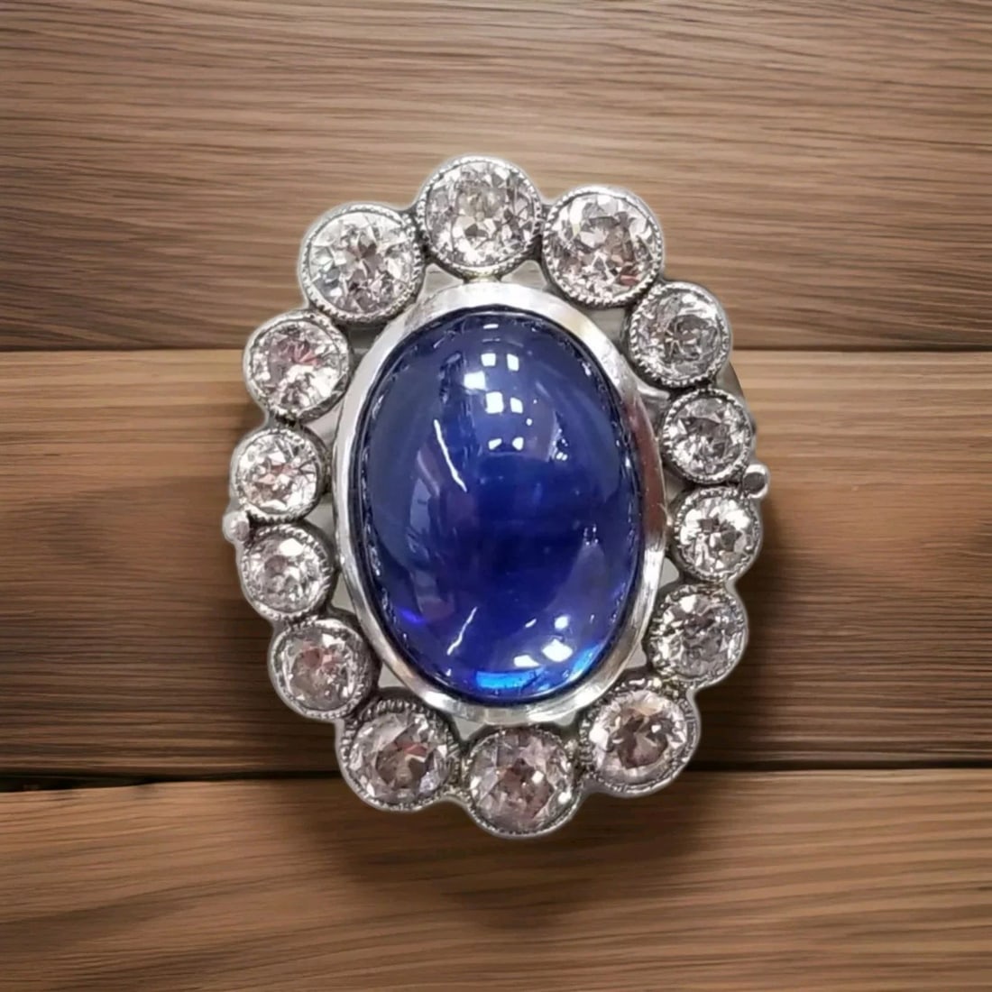 Platinum Vintage ring natural untreated blue Cabochon sapphire 7.35ct GIA Cert: PLATINUM VINTAGE RING NATURAL UNTREATED BLUE CABOCHON SAPPHIRE 7.35CT GIA CERT Gorgeous Vintage natural blue sapphire SET platinum ring center natural blue sapphire untreated oval cabochon shape weigh