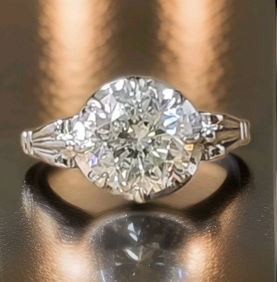 Platinum Vintage Engagement Ring 2.43ct. Natural Round Diamond Circa 1930's: Platinum Vintage Engagement Ring 2.43ct. Natural Round Diamond Circa 1930's Crafted in solid platinum, this exceptional Art Deco engagement ring dates to the 1930s and beautifully captures the timeles