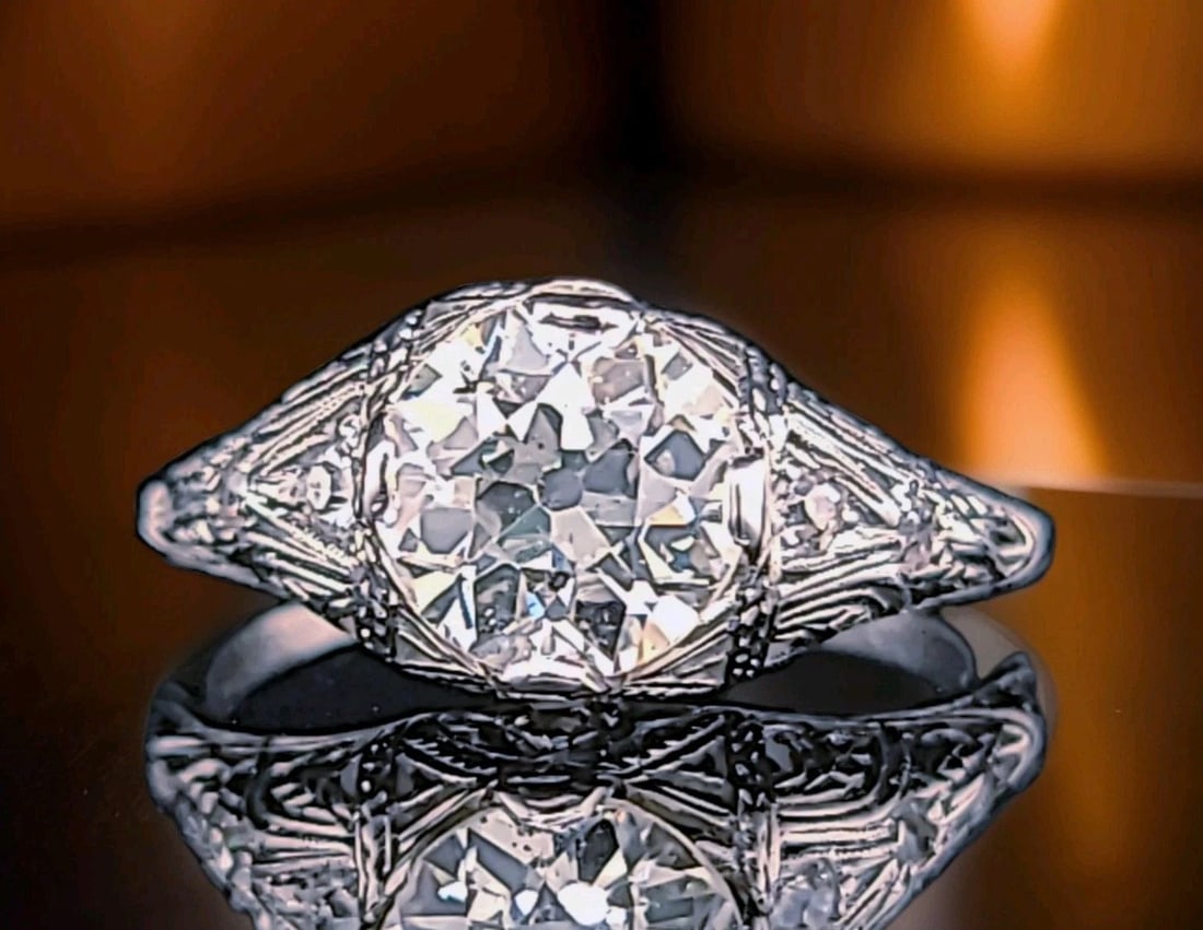Platinum Vintage Engagement Ring 2.02ct. Natural Old Euro Round Diamond 1920's: PLATINUM VINTAGE ENGAGEMENT RING 2.02CT. NATURAL OLD EURO ROUND DIAMOND 1920'S This exquisite Art Deco engagement ring features a 2.02ct natural round diamond set in solid platinum with intricate hand