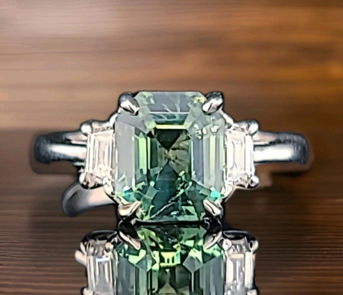 Vintage 14k White Gold Engagement Ring 3.00CT.Untreated Teal Sapphire GIA Cert: VINTAGE 14K WHITE GOLD ENGAGEMENT RING 3.00CT.UNTREATED TEAL SAPPHIRE GIA CERT This stunning vintage 14K white gold engagement ring features a rare natural untreated teal blue-green sapphire in a radi