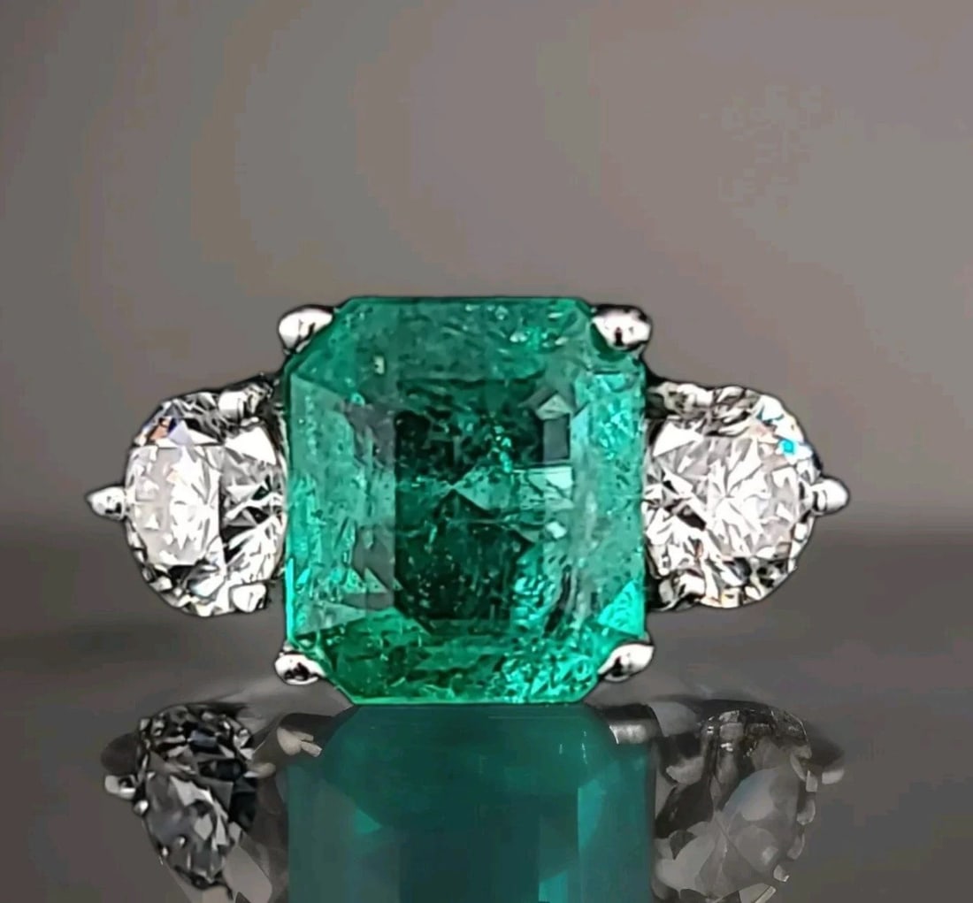 Vintage Platinum Engagement Ring 3.68CT. Natural Green Emerald GIA cert.: VINTAGE PLATINUM ENGAGEMENT RING 3.68CT. NATURAL GREEN EMERALD GIA CERT. GORGEOUS vintage platinum engagement ring gem natural green emerald in an emerald shape Center emerald weight 3.68ct. size 10.1