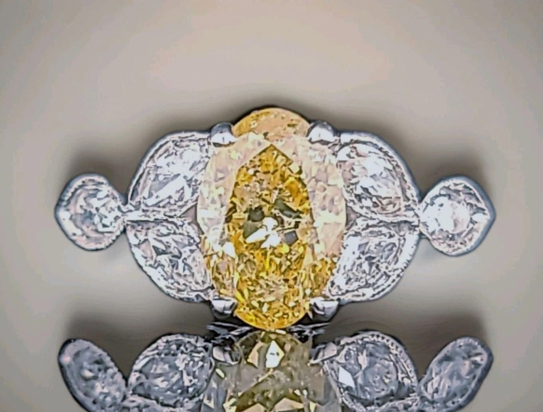 Vintage Platinum Engagement Ring 1.52CT.Natural Yellow Diamond Oval Shape: Vintage Platinum Engagement Ring 1.52CT.Natural Yellow Diamond Oval Shape This stunning vintage engagement ring is crafted in platinum and features a natural fancy oval yellow diamond weighing approxi