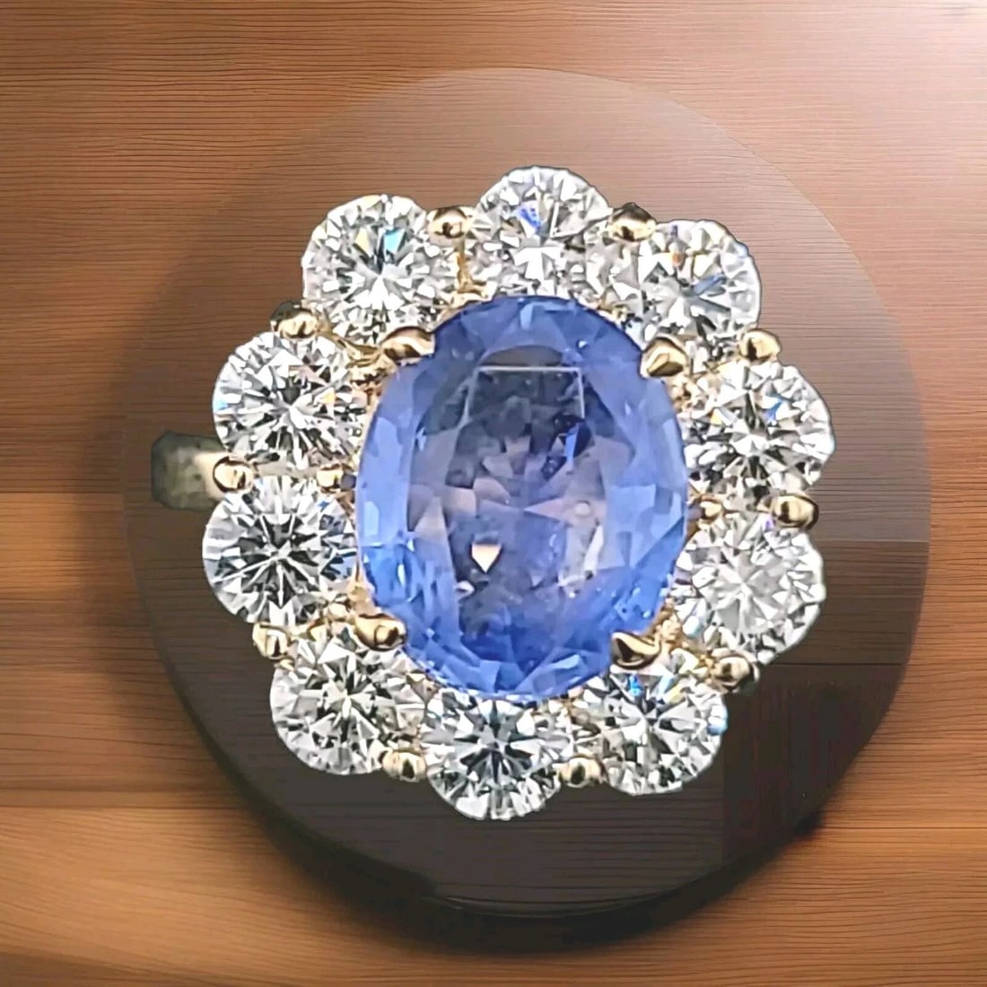 14k Yellow Gold Engagement Ring 3.79CT. Natural Untreated Oval Blue Sapphire: 14K YELLOW GOLD ENGAGEMENT RING 3.79CT. NATURAL UNTREATED OVAL BLUE SAPPHIRE This stunning engagement ring is crafted from 14kt yellow gold and features a beautiful oval-shaped blue sapphire stone, wi