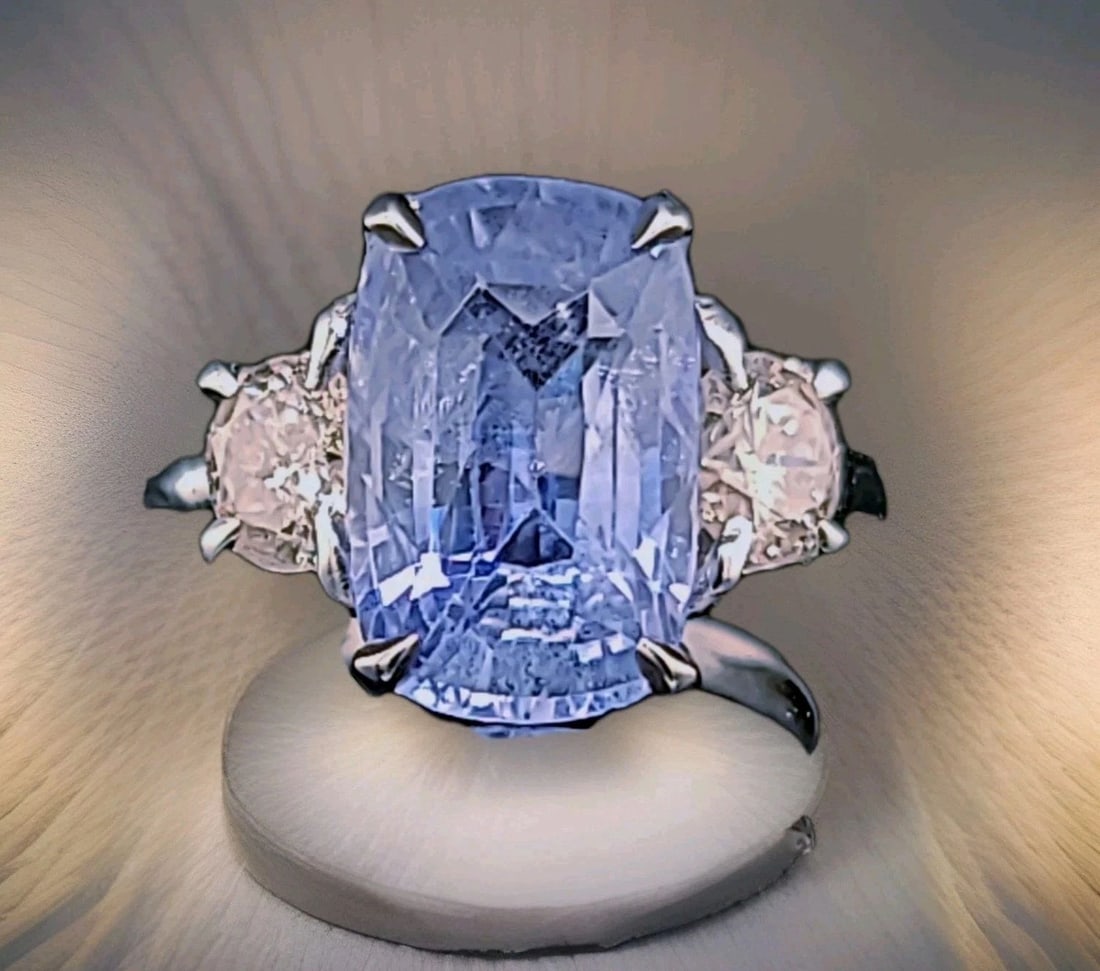 Vintage 14K White Gold Engagement Ring 6.15ct.Natural Blue Sapphire Cushion Cut: VINTAGE 14K WHITE GOLD ENGAGEMENT RING 6.15CT.NATURAL BLUE SAPPHIRE CUSHION CUT Step into timeless elegance with this magnificent vintage ring, showcasing a cushion-cut natural blue sapphire weighing 