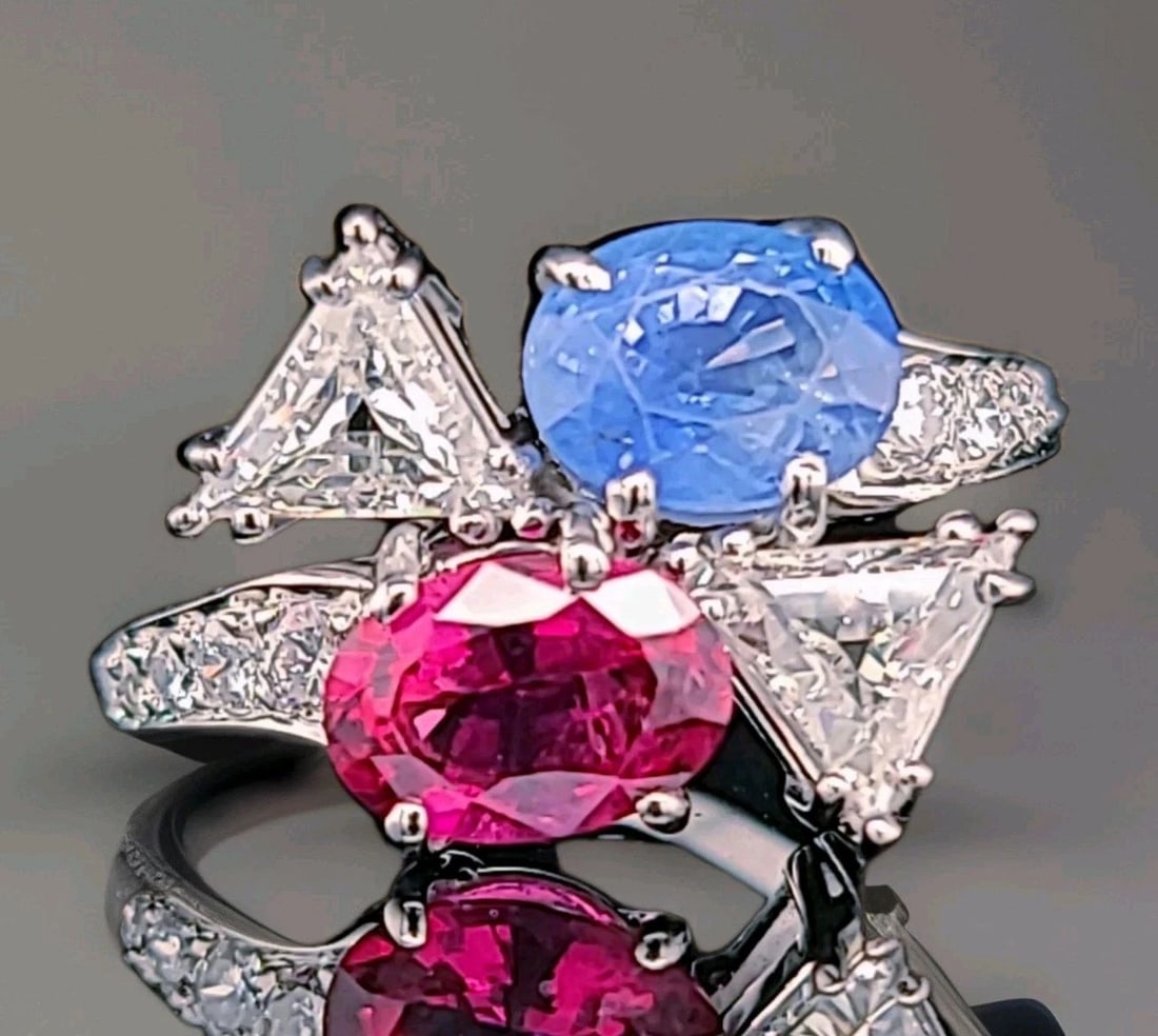 Platinum Vintage Diamond Ring 4.61ct.Natural Blue Sapphire Pink Tourmaline: PLATINUM VINTAGE DIAMOND RING 4.31CT.NATURAL BLUE SAPPHIRE PINK TOURMALINE This Platinum Vintage Diamond Ring features a stunning oval-shaped natural blue sapphire and pink tourmaline as the main ston