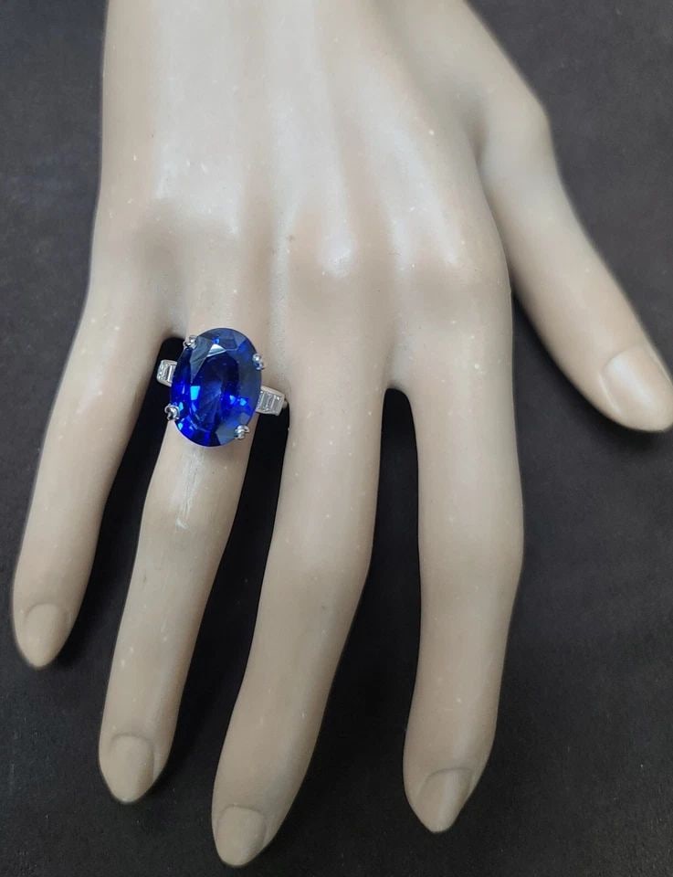 Vintage Platinum Engagement Ring 12.58ct. Gem Lab Grown Blue Sapphire Oval Cut: VINTAGE PLATINUM ENGAGEMENT RING 12.58CT. GEM DIFFUSED BLUE SAPPHIRE OVAL SHAPE Gorgeous Vintage platinum engagement Sapphire ring. center natural diffused treatment sapphire in oval shape weight 12.5