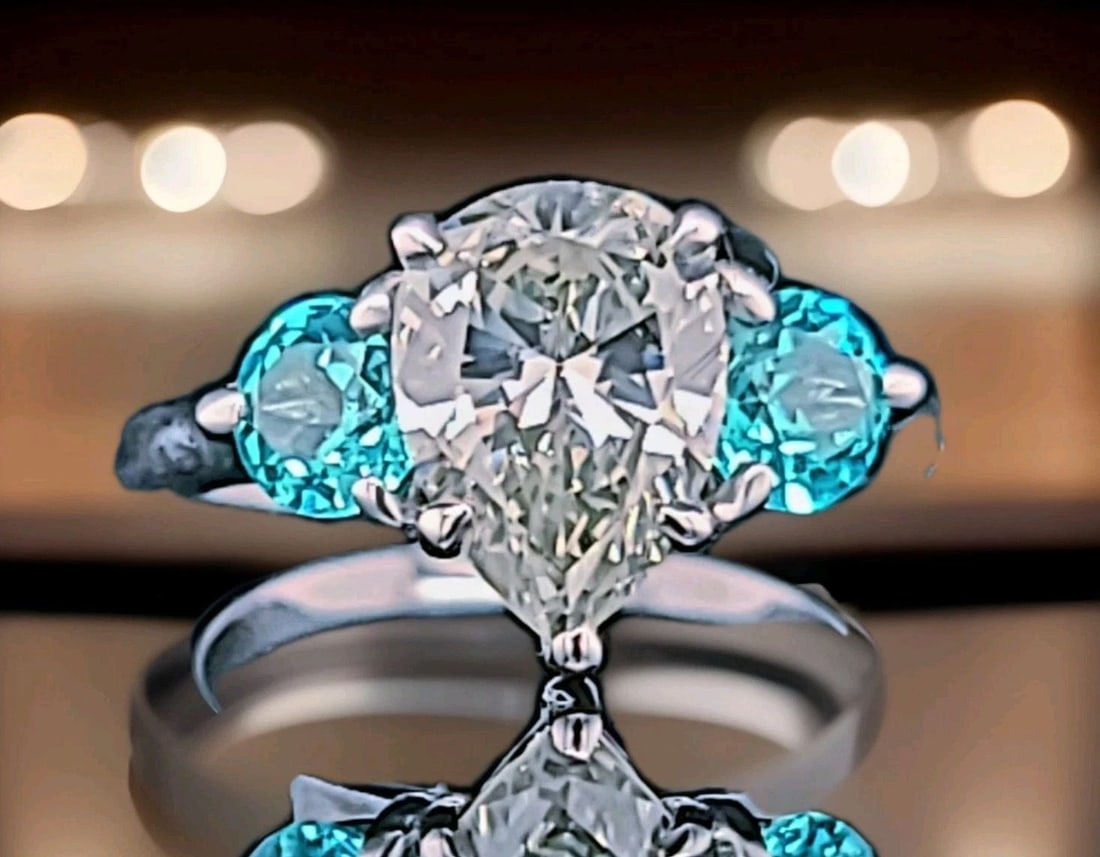 14k White Gold Engagement Ring 2.01ct.Natural Pear Greenish Yellow Diamond GIA: 14K WHITE GOLD ENGAGEMENT RING 2.01CT.NATURAL PEAR GREENISH YELLOW DIAMOND GIA This exquisite vintage ring is crafted in solid 14K white gold and features a stunning natural Fancy gray-greenish yellow