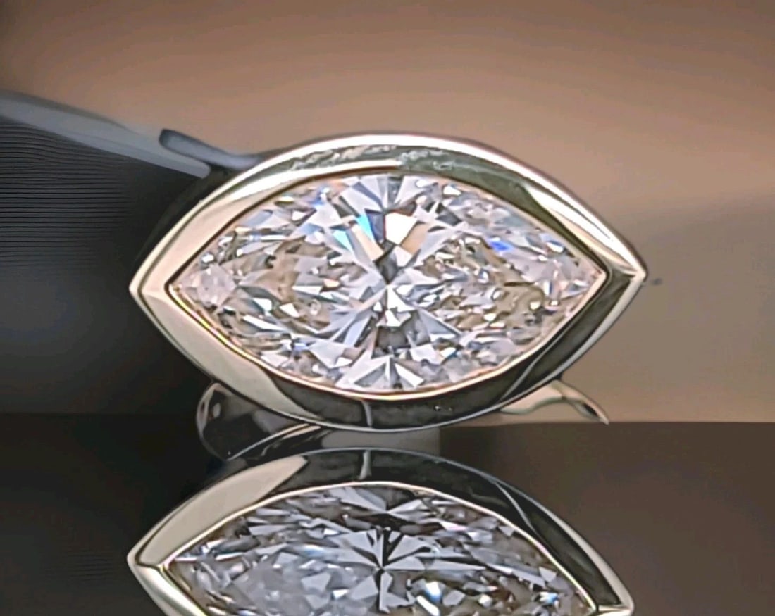 Vintage 14k Yellow Gold Engagement Ring 5.00ct.Lab-Grown Marquise Diamond: VINTAGE 14K YELLOW GOLD ENGAGEMENT RING 5.00CT.LAB-GROWN MARQUISE DIAMOND This stunning vintage engagement ring is expertly crafted in rich 14K yellow gold and showcases a breathtaking lab-grown marqu