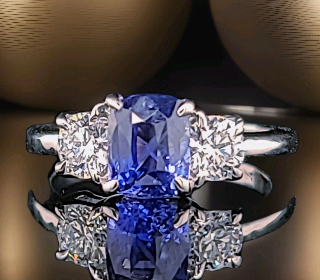14K White gold Engagement Ring 1.84ct.Natural Blue Sapphire Cushion Cut GIA Cert: 14K WHITE GOLD ENGAGEMENT RING 1.84CT.NATURAL BLUE SAPPHIRE CUSHION CUT GIA CERT This 14K White Gold Engagement Ring features a stunning 1.84ct Natural Blue Sapphire in a Cushion Cut, accompanied by t