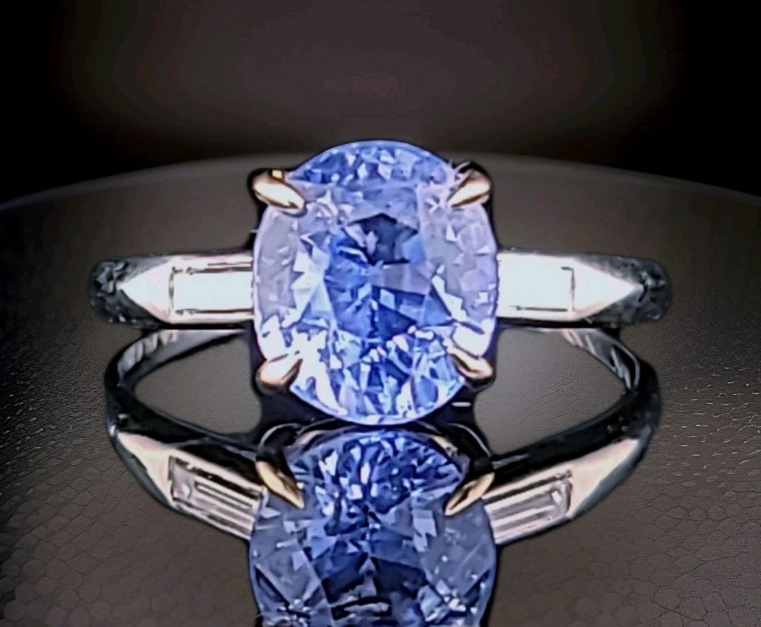 3.05ct.Natural Blue Sapphire Platinum 14k Gold Engagement Vintage ring GIA Cert: 3.05CT.NATURAL BLUE SAPPHIRE PLATINUM 14K GOLD ENGAGEMENT VINTAGE RING GIA CERT A truly breathtaking platinum and 14K yellow gold engagement ring, centered with a captivating natural, untreated blue s