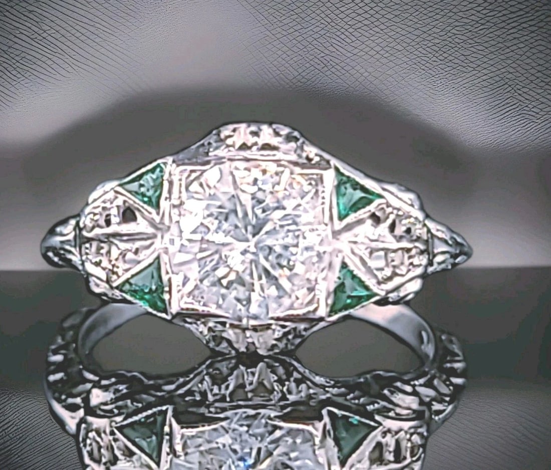 20k White Gold Vintage Filigree Engagement Ring 1.26ct Natural round diamond: 20K WHITE GOLD VINTAGE FILIGREE ENGAGEMENT RING 1.26CT NATURAL ROUND DIAMOND This vintage 20k white gold engagement ring features a beautiful 1.26ct natural round diamond as the main stone, set in a c