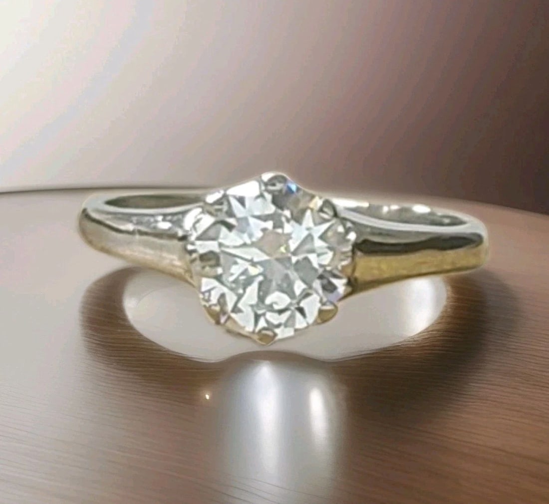 Platinum Vintage Engagement Ring 1.02ct. Natural Round Cut Diamond GIA Cert: Platinum Vintage Engagement Ring 1.02ct. Natural Round Cut Diamond GIA Cert A timeless 1940s vintage engagement ring, masterfully crafted in platinum and embodying the elegance . At its center rests a