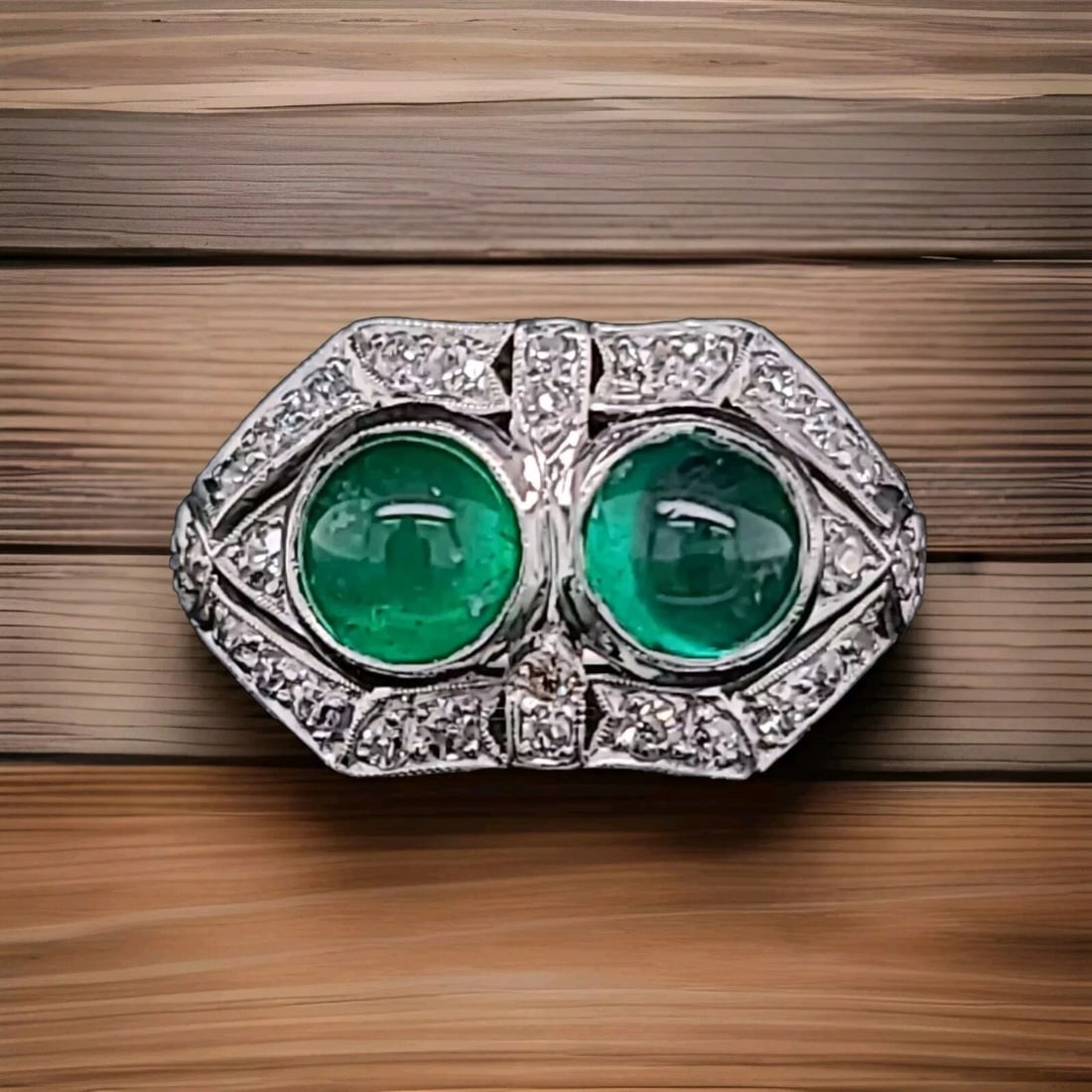 2.15ct. Platinum Vintage Filigree Natural Emerald Cabochon Ring Circ 1930's: 2.15CT. PLATINUM VINTAGE FILIGREE NATURAL EMERALD CABOCHON RING CIRC 1930'S This stunning vintage ring boasts a beautiful natural emerald cabochon set in a platinum band with a pavé setting style. Th