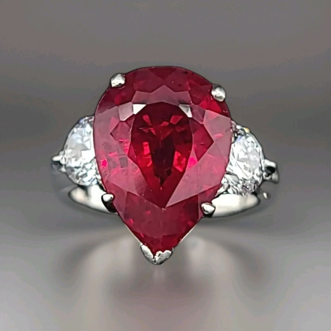Vintage Platinum Engagement Ring 6.53CT. Lab Grown Ruby Pear Shape: VINTAGE PLATINUM ENGAGEMENT RING 6.53CT. LAB-CREATED RUBY PEAR SHAPE GORGEOUS VINTAGE PLATINUM ENGAGEMENT RING CENTER gem lab created grown ruby IN PEAR SHAPE WEIGHT 6.53CARAT size 10X14.2mm GORGEOUS 