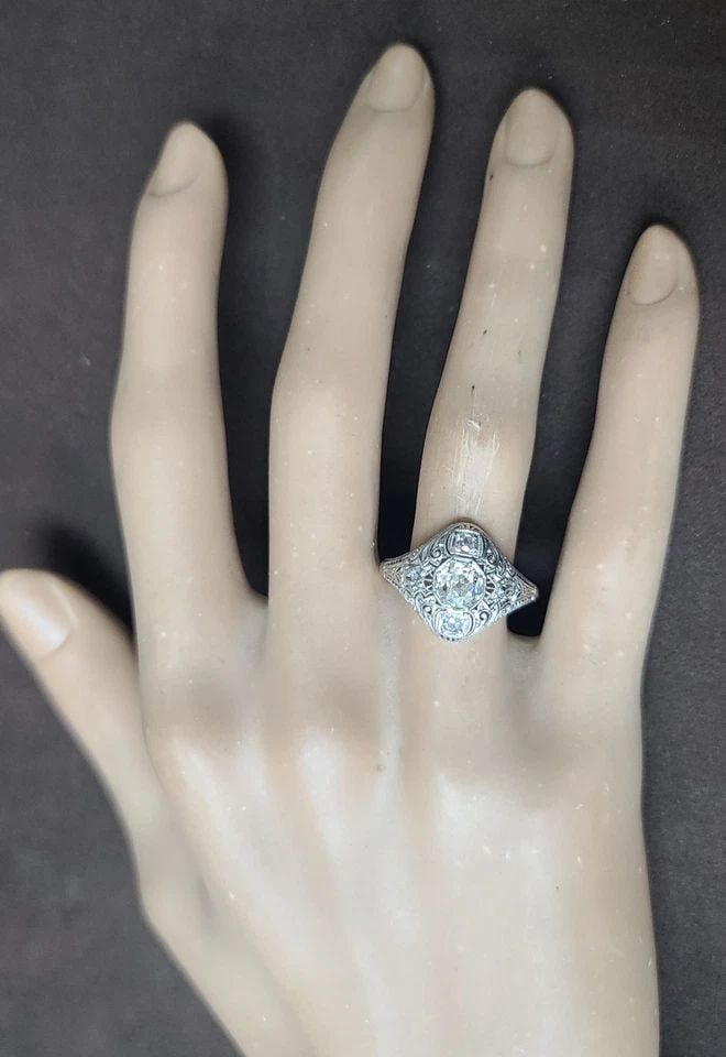 18k White Gold Vintage Filigree ring 0.82ct. Natural Old Mine Cut Diamond 1920': 18K WHITE GOLD VINTAGE FILIGREE RING 0.82CT. NATURAL OLD MINE CUT DIAMOND 1920' This 18k White Gold Vintage Filigree ring features approx center weight of 0.82ct natural old mine cut diamond, SI1 clar