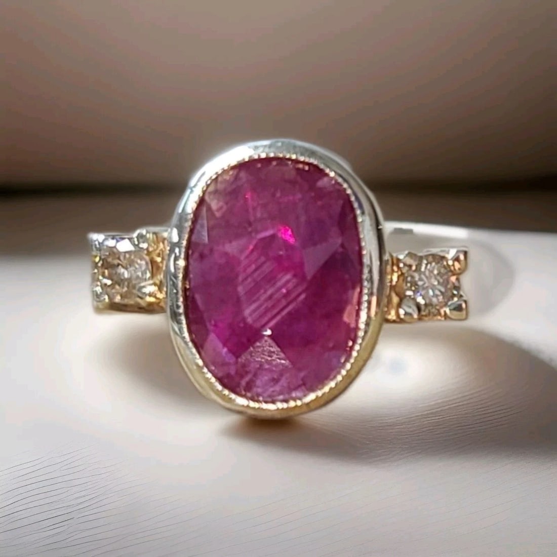 Vintage Silver Engagement Ring 4.62ct. Natural Untreated Oval Ruby GIA CERT: VINTAGE SILVER ENGAGEMENT RING 4.62CT. NATURAL UNTREATED OVAL RUBY GIA CERT This Vintage Silver Engagement Ring features a stunning 4.62ct natural oval ruby with a vibrant red color, certified by GIA.