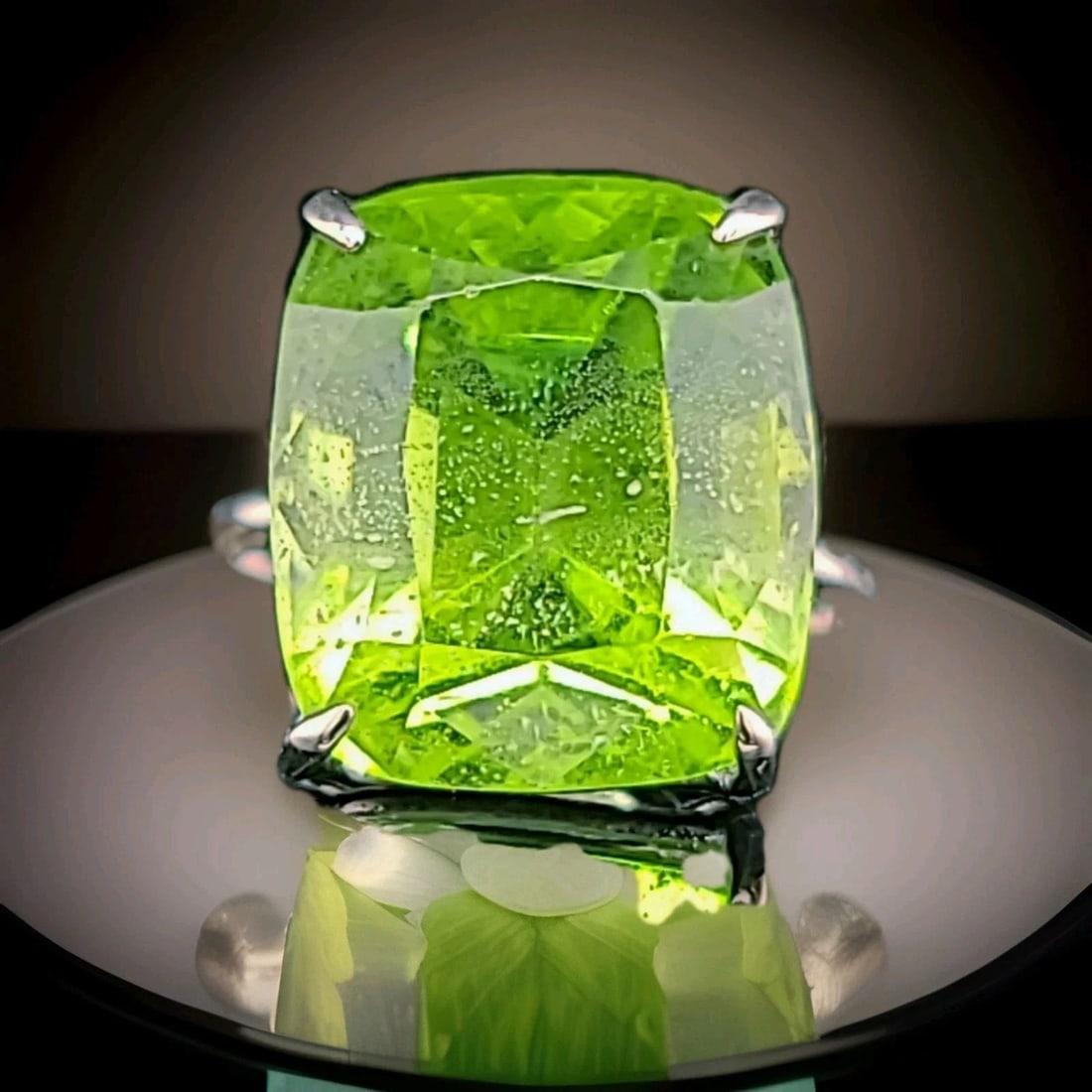 Vintage 14k White Gold Engagement Ring 21.01CT. Natural Green Peridot Cushion: VINTAGE 14K WHITE GOLD ENGAGEMENT RING 21.01CT. NATURAL GREEN PERIDOT CUSHION This vintage 14k white gold engagement ring features a stunning 21.01CT natural green peridot cushion as the main stone. T