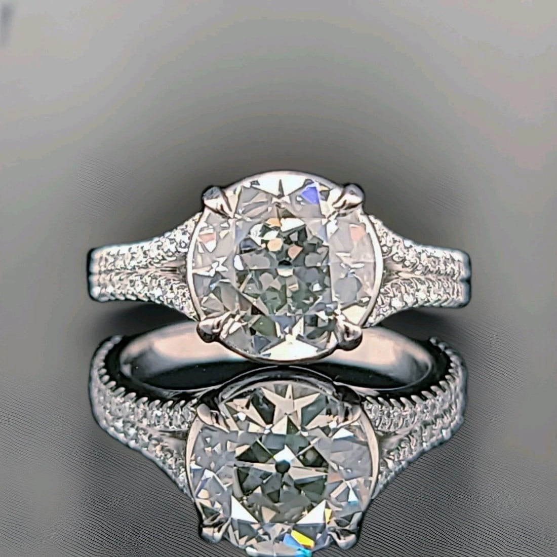 Vintage Platinum Engagement Ring 2.35CT.Lab Grown Diamond Old Euro Cut VS-J-K: VINTAGE PLATINUM ENGAGEMENT RING 2.35CT.LAB GROWN DIAMOND OLD EURO CUT VS-J-K This Vintage Platinum Engagement Ring features a 2.35CT lab grown diamond in an old Euro cut, accented by smaller diamonds