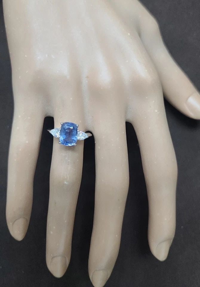 14K white gold engagement ring 2.71ct. Natural Blue Sapphire Cushion cut: 14K WHITE GOLD ENGAGEMENT RING 2.71CT. NATURAL BLUE SAPPHIRE CUSHION CUT Gorgeous 14k white gold natural blue sapphire engagement ring center natural blue sapphire in cushion shape weight 2.71ct. Size