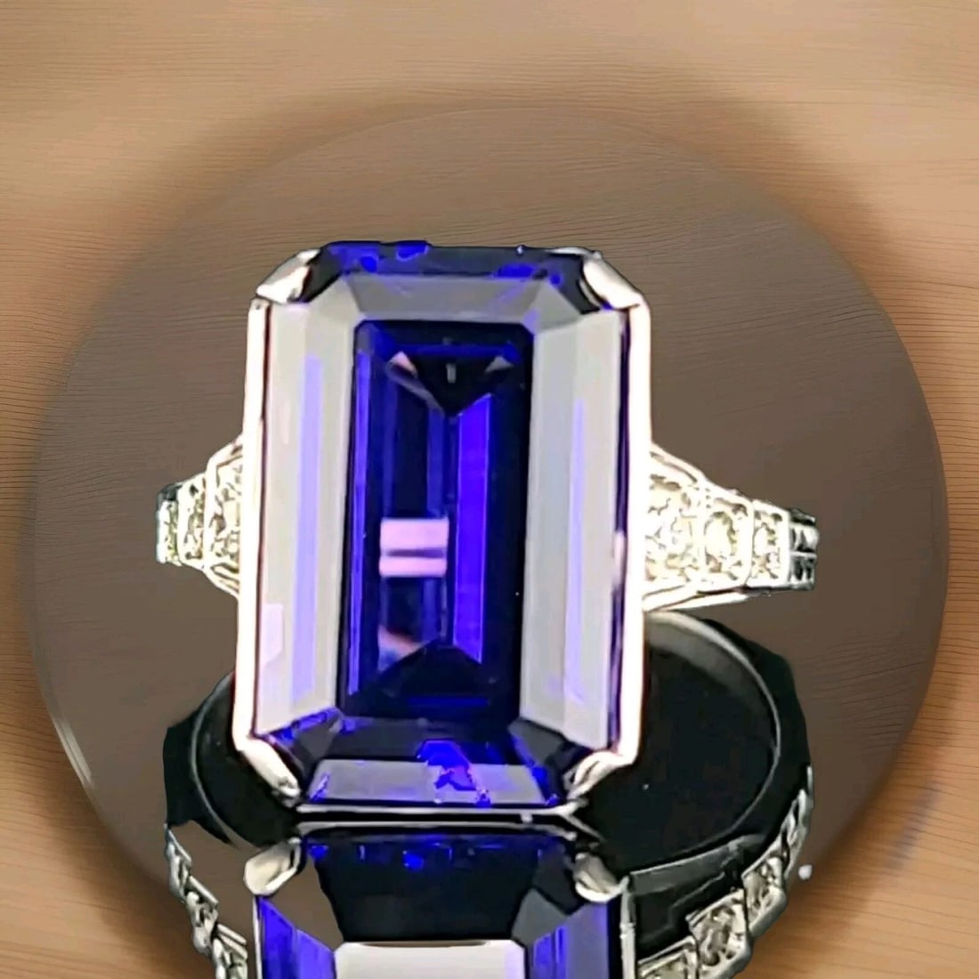 Vintage 14k White Gold Engagement Ring 8.02CT. Lab Grown Violet Blue Tanzanite: VINTAGE 14K WHITE GOLD ENGAGEMENT RING 8.02CT. TANZANITE RECTANGULAR CUT This vintage engagement ring is a stunning piece of fine jewelry that will make any woman's heart race. The ring features a lab