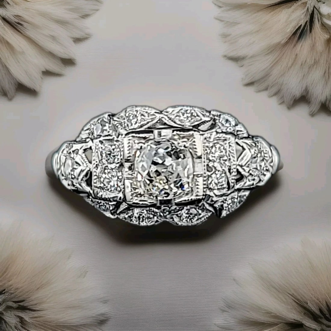 Filigree Vintage Platinum Engagement Ring 0.77ct. Natural Old Mine Diamond: 0.77CT. FILIGREE VINTAGE PLATINUM ENGAGEMENT RING NATURAL OLD MINE DIAMOND Here is an outstanding aer deco filigree platinum diamond engagement ring,the beautiful set natural old mine cut vintage plat