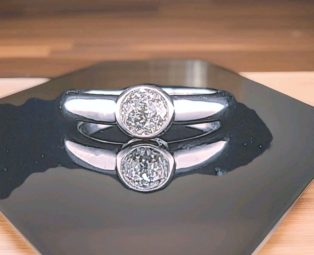 Vintage 14k White Gold Engagement Bezel Ring 0.75ct.Natural Round Diamond GIA: VINTAGE 14K WHITE GOLD ENGAGEMENT BEZEL RING 0.75CT.NATURAL ROUND DIAMOND GIA Make a heartfelt statement with this enchanting vintage engagement ring, beautifully crafted in warm 14K white gold. At it