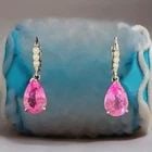 14k white gold Lab Grown pink sapphire Drop earrings 6.58CT pear shape: 14K WHITE GOLD GEM PINK SAPPHIRE EARRINGS 6.58CT PEAR SHAPE Gorgeous 14k white gold earrings 6.58ct total weight lab grown pink sapphire in pear shape ,size 12x9mm Very clean, nice cut,very brilliant 