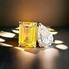 14k Yellow Gold 3.72ct. Natural Yellow Sapphire Diamond Pear Toi Et Moi Ring: This stunning 14k yellow gold ring is the perfect choice for any special occasion, whether it be an engagement, anniversary, or birthday. The ring features a beautiful 2.61 carat natural yellow sapphi