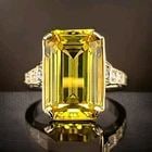 Vintage 14k Yellow Gold Engagement Ring 8.95CT.lab Grown Yellow Vivid Sapphire: VINTAGE 14K YELLOW GOLD ENGAGEMENT RING 8.95CT. GEM YELLOW SAPPHIRE EMERALD CUT This vintage engagement ring is crafted from 14k yellow gold and features a stunning 8.95CT lab-grown yellow sapphire ge