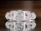 Platinum Vintage Filigree Engagement Ring 0.78ct. Natural Old Mine Cut Diamond: PLATINUM VINTAGE FILIGREE ENGAGEMENT RING 0.78CT. NATURAL OLD MINE CUT DIAMOND This Platinum Vintage Filigree Engagement Ring features a 0.78ct. Natural Old Mine Cut Diamond, making it a timeless and 