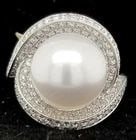 18K WHITE GOLD NATURAL DIAMOND ROUND PEARL RING: 18K WHITE GOLD NATURAL DIAMOND ROUND PEARL RING Gorgeous 18k white gold diamond pearl ring center natural south sea white pearl size 12mm round shape. side set diamonds 0.96ct tw. SI1-H Quality clean,