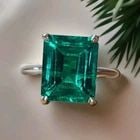 Vintage 14k White Gold Engagement Ring 5.54ct.Lab Grown Green Emerald Shape: VINTAGE 14K WHITE GOLD ENGAGEMENT RING 5.54CT.GEM GREEN EMERALD This stunning 14k white gold ring features a breathtaking 5.54ct. Green Emerald in an emerald cut. The ring is perfect for any occasion.
