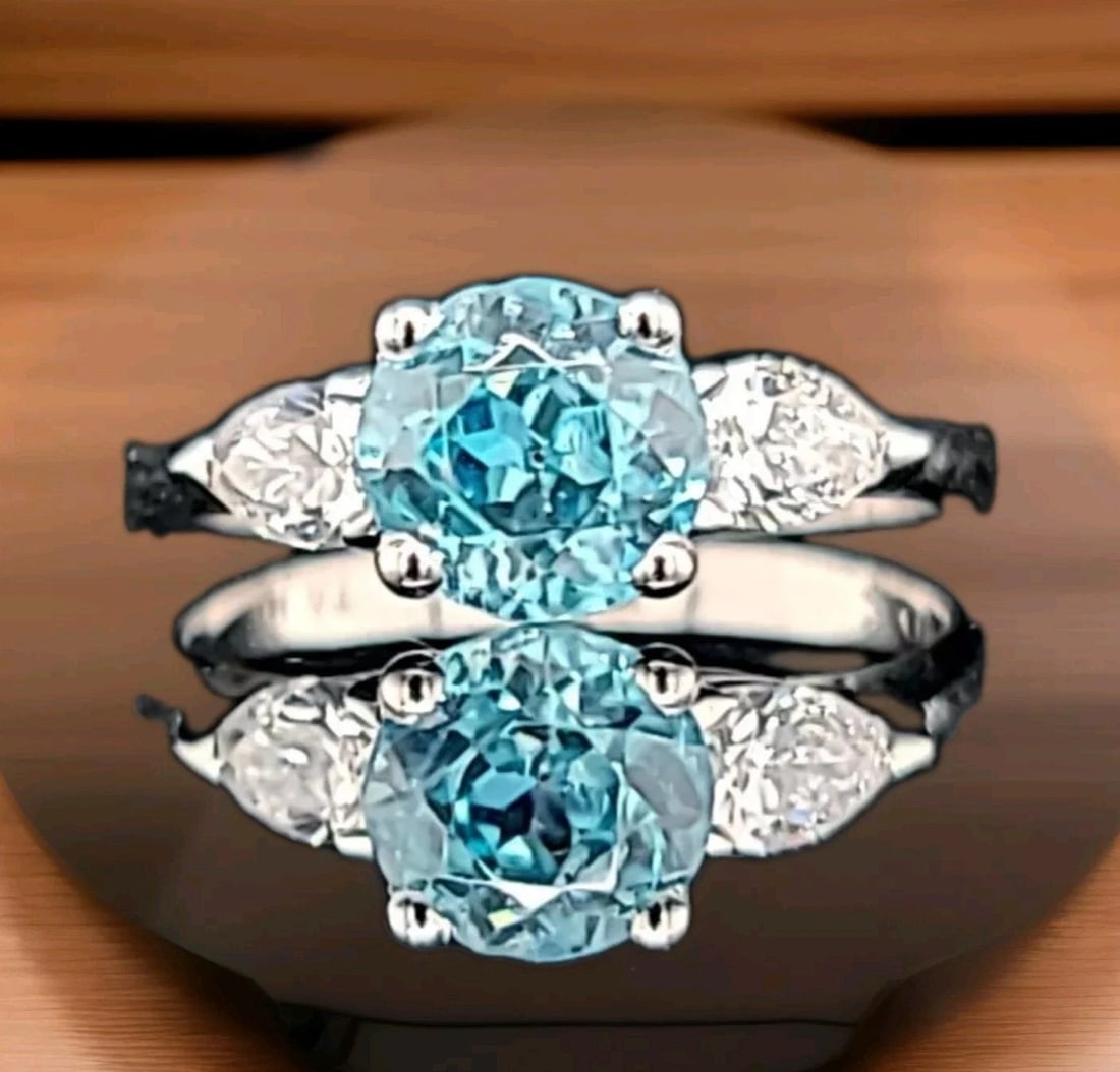 Vintage Platinum Engagement Ring 2.48CT.Natural Blue Zircon Round Shape: VINTAGE PLATINUM ENGAGEMENT RING 2.48CT.NATURAL BLUE ZIRCON ROUND SHAPE Gorgeous platinum vintage engagement ring natural blue zircon round shape circ 1960's Center natural blue zircon in round shape 