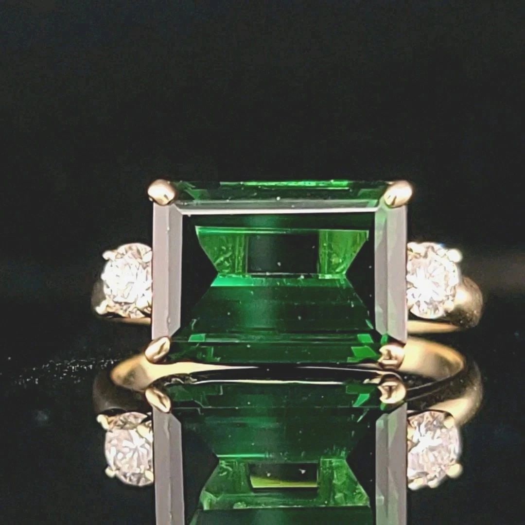 Vintage 14k Yellow Engagement Ring 5.07CT. Natural Green Tourmaline Emerald Cut: VINTAGE 14K YELLOW ENGAGEMENT RING 5.07CT. NATURAL GREEN TOURMALINE EMERALD CUT This vintage 14k yellow gold engagement ring is a stunning piece of fine jewelry that will catch the eye of any collecto
