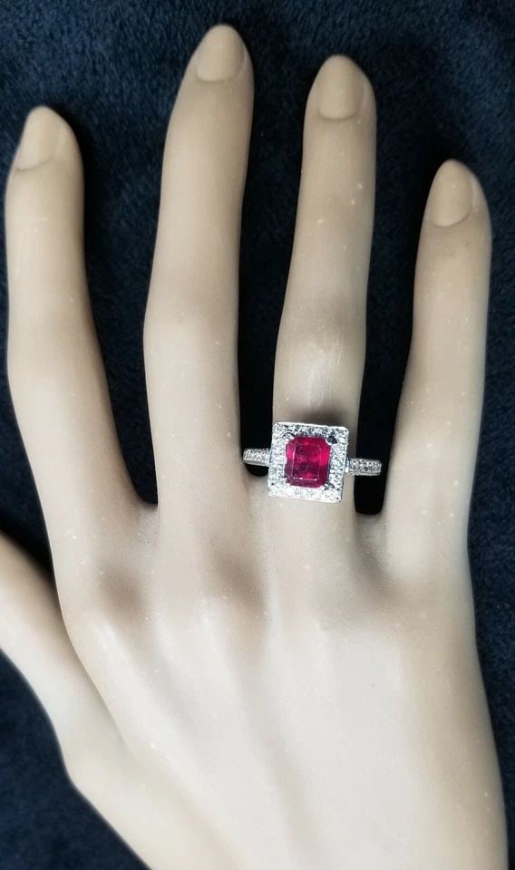 14k White Gold 1.82ct. Engagement Ring Natural Filled Ruby Radiant Shape: 14K WHITE GOLD 1.82CT. ENGAGEMENT RING NATURAL RUBY RADIANT SHAPE Gorgeous natural ruby Diamond 14k white gold engagement ring center natural glass filled ruby weight 1.82ct SIZE 7x6mm Gorgeous vivid 