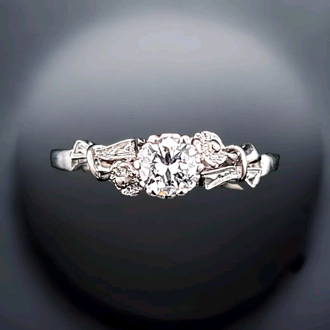 Platinum Vintage Filigree Engagement Ring 0.38ct. Natural Old Euro Cut Diamond: PLATINUM VINTAGE FILIGREE ENGAGEMENT RING 0.38CT. NATURAL OLD EURO CUT DIAMOND This stunning vintage engagement ring is a true beauty. Crafted from platinum, it features a round old Euro cut diamond w