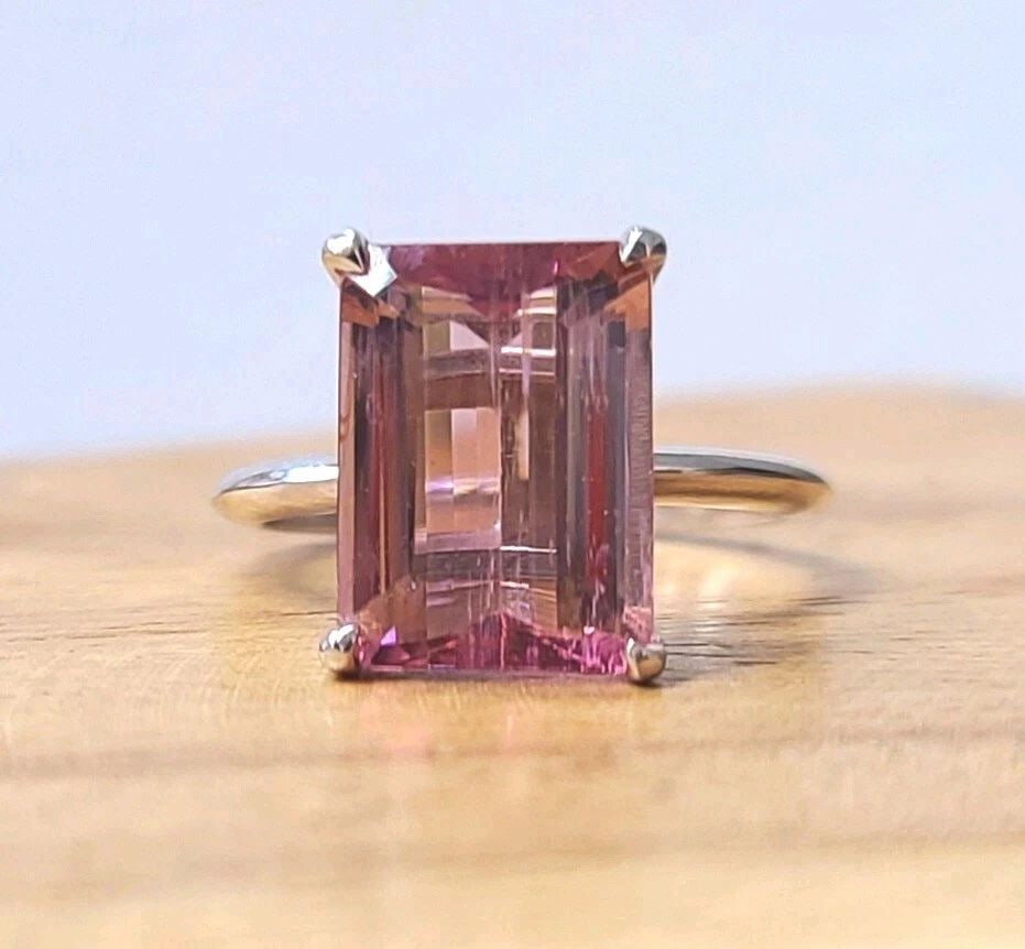 Vintage 14k white gold engagement ring 5.27ct. Natural Pink Tourmaline: VINTAGE 14K WHITE GOLD ENGAGEMENT RING 5.27CT. NATURAL PINK TOURMALINE This stunning 14k white gold ring features a breathtaking 5.27ct natural pink tourmaline in an emerald cut. The ring is perfect f
