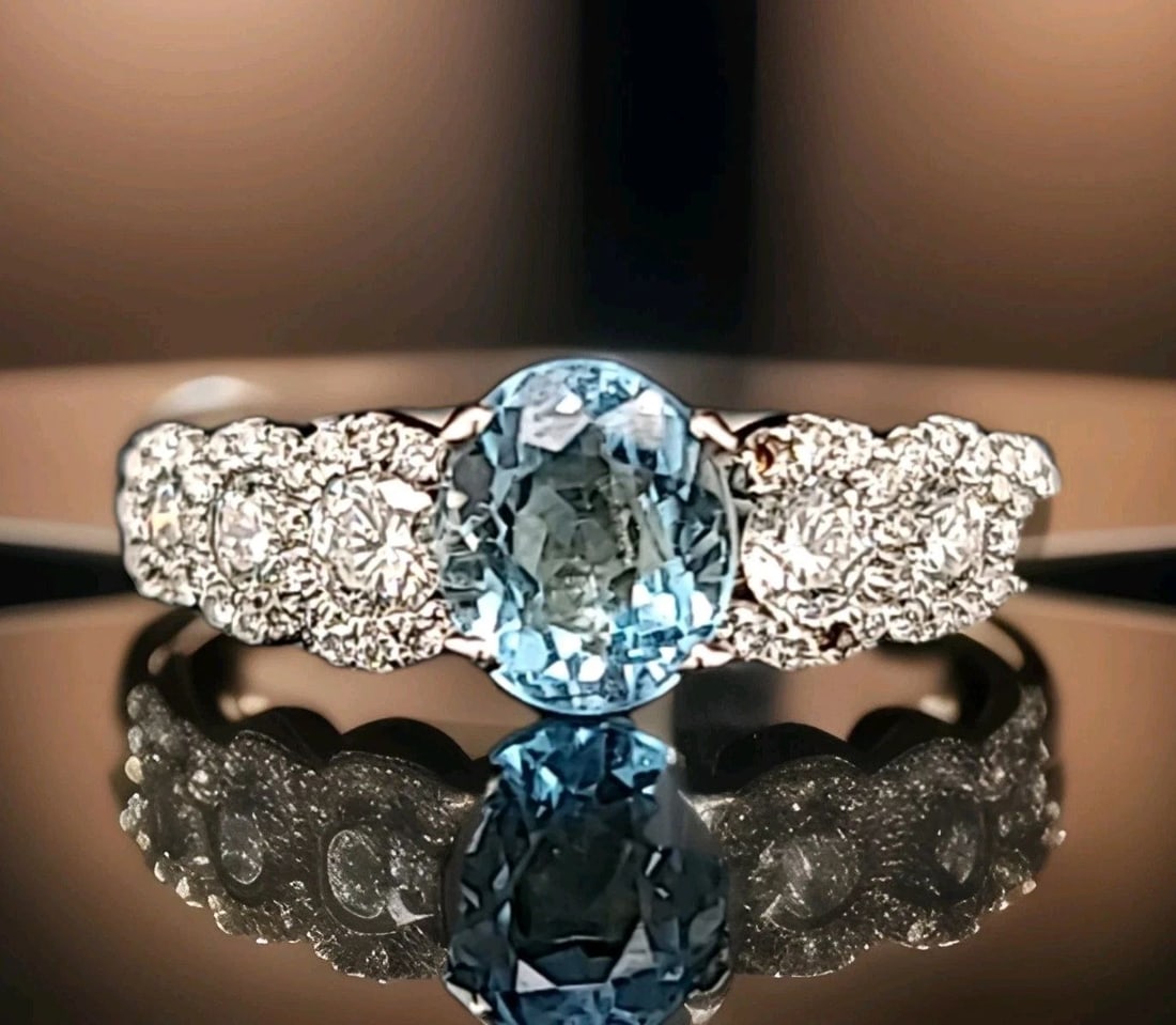 18k White Gold Engagement Ring 1.00ct. Natural Sky Blue Aquamarine Oval Shape: 18K WHITE GOLD ENGAGEMENT RING 1.00CT. NATURAL SKY BLUE AQUAMARINE OVAL SHAPE 18k White gold ring , center natural gem blue aquamarine oval shape weight 1.00ct. size 6.5x5.5mm sparkly stone,lively,nic