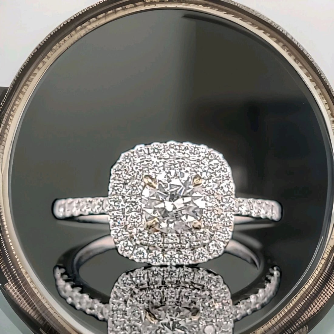 18K White Gold Engagement Ring 1.07CT. Lab-grown Diamond Round Shape: 18K WHITE GOLD ENGAGEMENT RING 1.07CT. LAB-GROWN DIAMOND ROUND SHAPE This stunning 18K white gold ring is the perfect symbol of your eternal love. The lab-grown diamond with round shape and white/colo