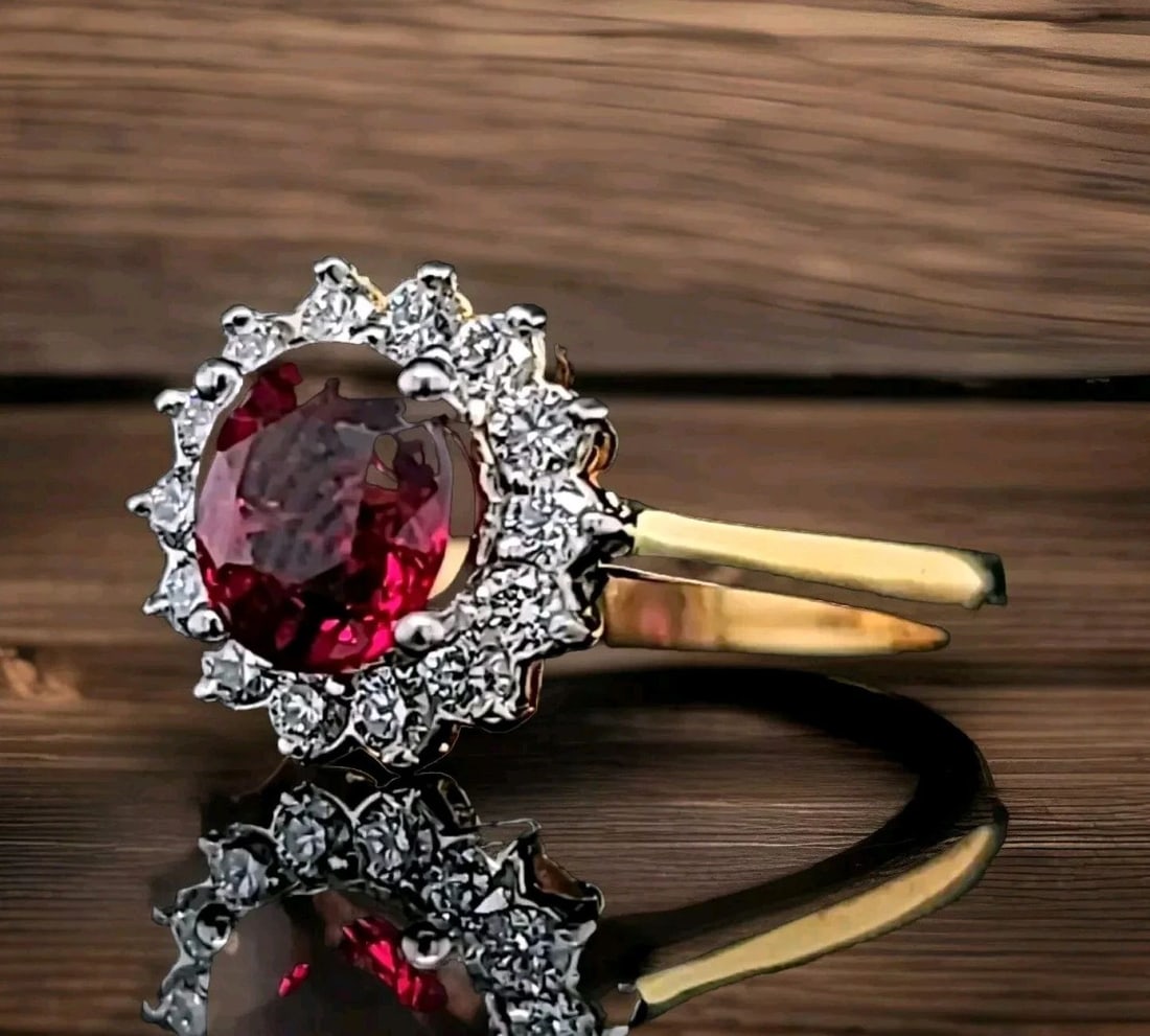 14K Yellow Gold Engagement Ring 1.70CT. Natural Red Garnet Round Shape: 14K YELLOW GOLD ENGAGEMENT RING 1.70CT. NATURAL RED GARNET ROUND SHAPE This stunning 14K yellow gold engagement ring is perfect for any special occasion, from Christmas to Valentine's Day. The beautif