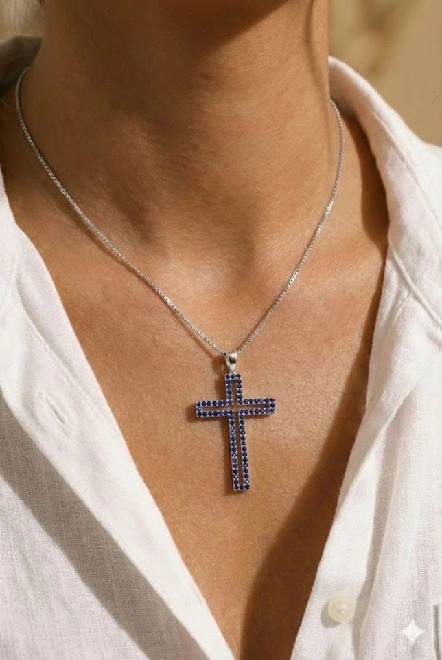 14k white gold necklace cross Pendant 1.45ct natural blue sapphire: 14k white gold necklace cross Pendant 1.45ct natural blue sapphire Beautiful 14K white gold necklace featuring a cross pendant set with a natural blue sapphire totaling 1.45 carats. The cross measures