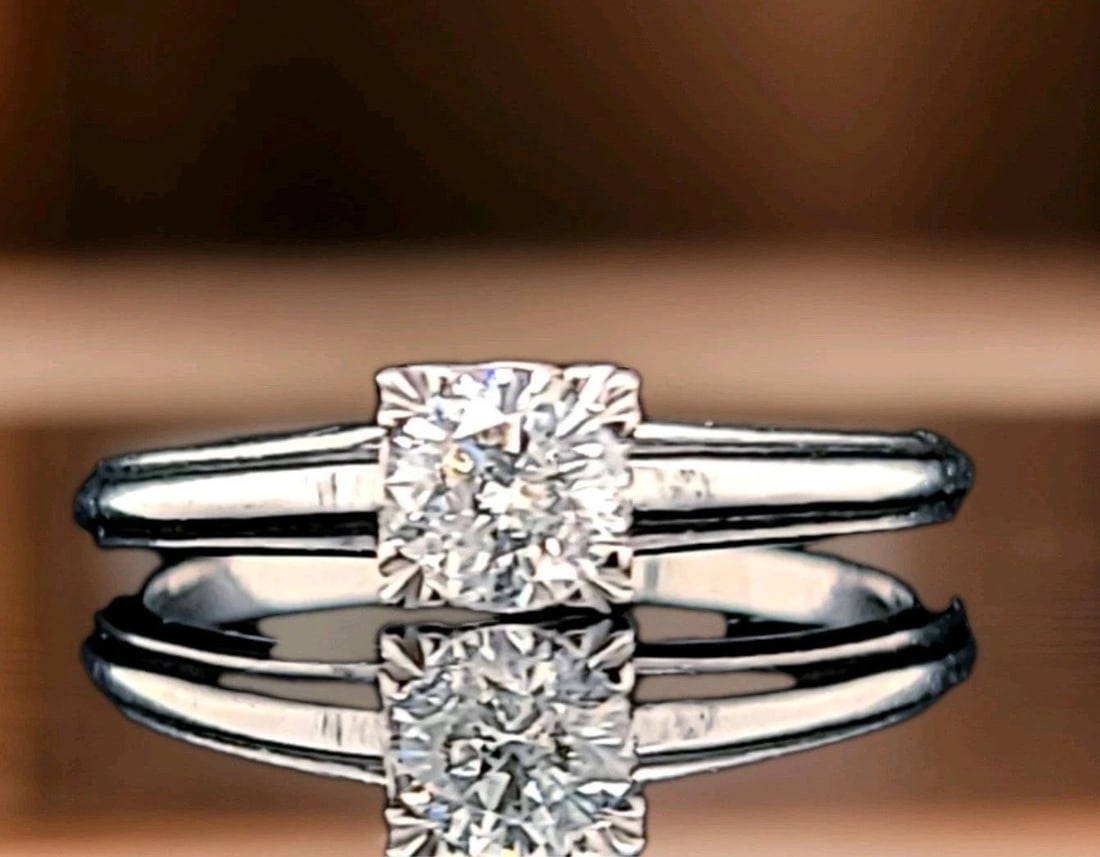 0.45ct. Palladium Vintage Engagement ring natural euro Cut round diamond H-I1: 0.45CT. PALLADIUM VINTAGE ENGAGEMENT RING NATURAL EURO CUT ROUND DIAMOND H-I1 This beautiful vintage engagement ring features a stunning 0.45ct natural round diamond with a H-I1 color grade. The solit