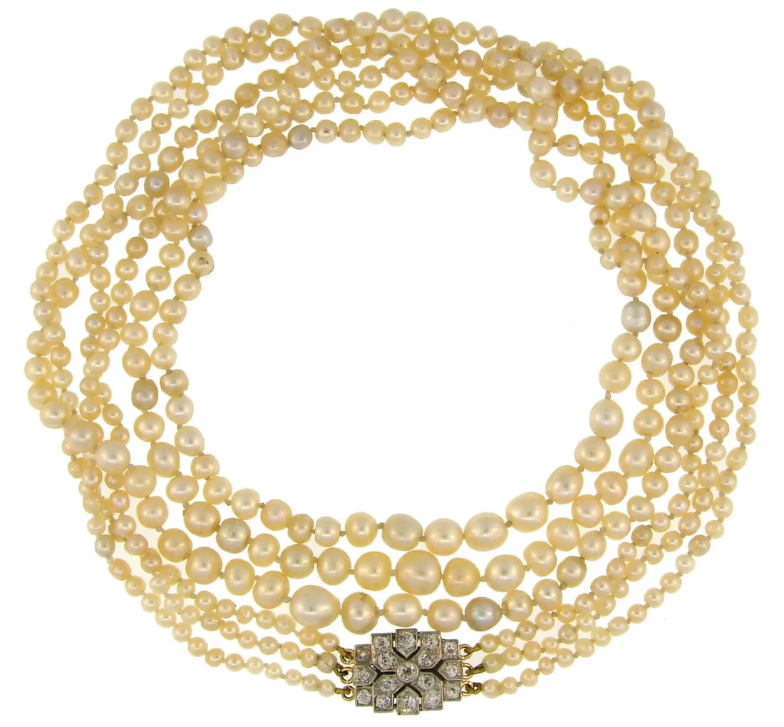 VICTORIAN NATURAL SALTWATER PEARL NECKLACE WITH DIAMOND CLASP ANTIQUE JEWELRY: Victorian Platinum 14 karat Yellow Gold Natural Pearl Diamond Necklace Victorian natural pearl necklace with a gorgeous clasp. Features three strands of natural pearls culminating with a diamond clasp
