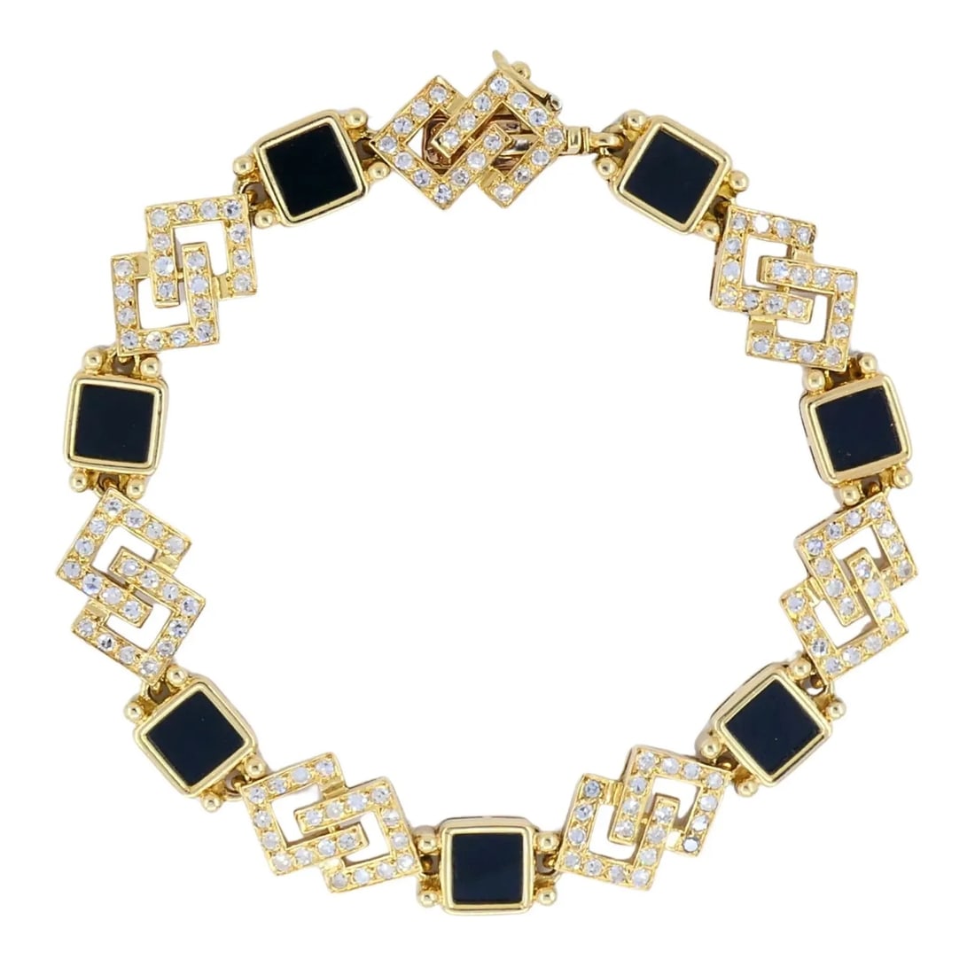 VINTAGE VAN CLEEF & ARPELS 18K GOLD DIAMOND ONYX BRACELET: VINTAGE VAN CLEEF & ARPELS 18K GOLD DIAMOND ONYX BRACELET This Van Cleef & Arpels bracelet is crafted in 18K yellow gold with alternating onyx and diamond-set geometric links. The design reflects the 
