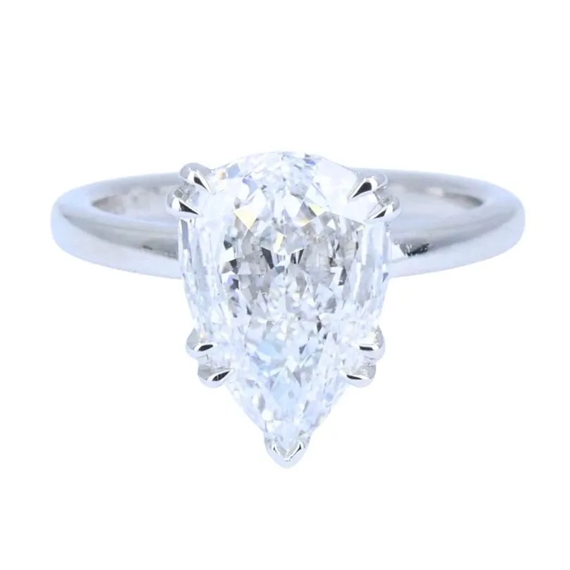 PEAR SHAPED DIAMOND PLATINUM ENGAGEMENT RING 1.71 CARAT GIA D VS2 ESTATE JEWELRY: PEAR SHAPED DIAMOND PLATINUM ENGAGEMENT RING 1.71 CARAT GIA D VS2 ESTATE JEWELRY VK GTOO Diamond Platinum Engagement Ring A platinum ring featuring a 1.71-carat pear brilliant cut diamond set in a cla