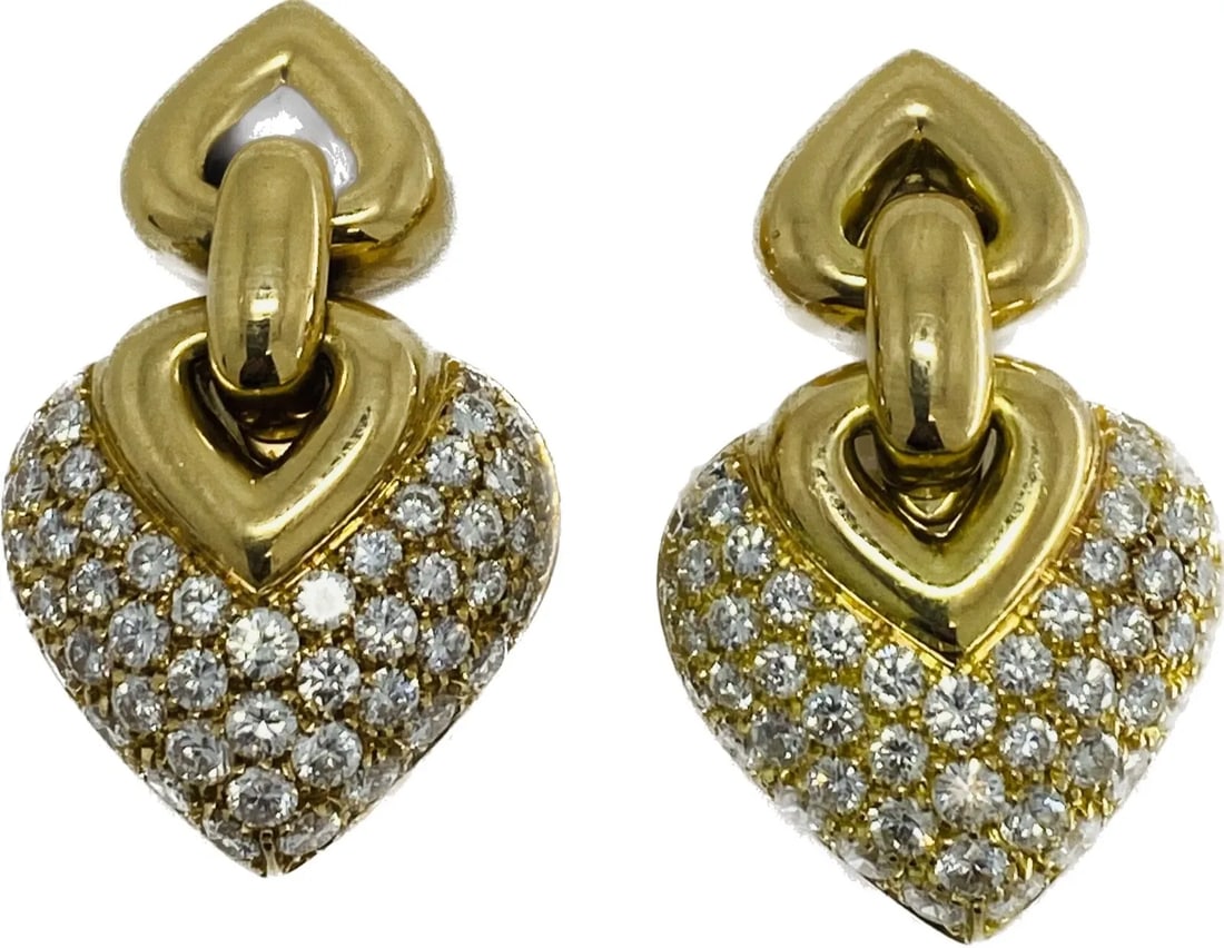 BVLGARI DOPPIO CUORE DIAMOND EARRINGS: BULGARI DOPPIO CUORE DIAMOND EARRINGS A pair of Bulgari Doppio Cuore diamond 18k gold earrings. The earrings are a part of sought-after Doppio Cuore collection. The earrings are designed as two dangli