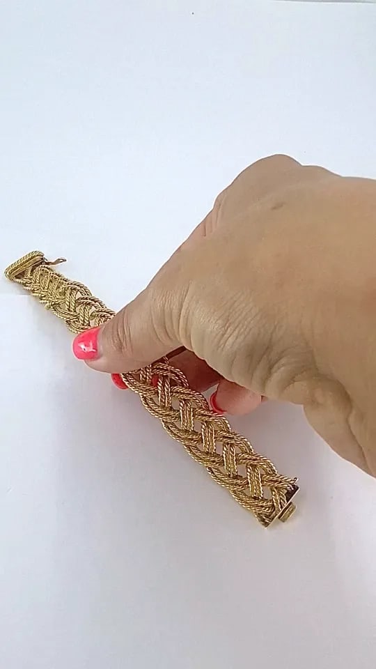 BOUCHERON PARIS 18K GOLD BRAIDED ROPE BRACELET: BOUCHERON PARIS 18K GOLD BRAIDED ROPE BRACELET DESIGNER: Boucheron CIRCA: Mid-20th Century MATERIALS: 18k Gold WEIGHT: 56.2 Grams MEASUREMENTS: 5/8” x 6 1/2" HALLMARKS: Boucheron Paris & French 